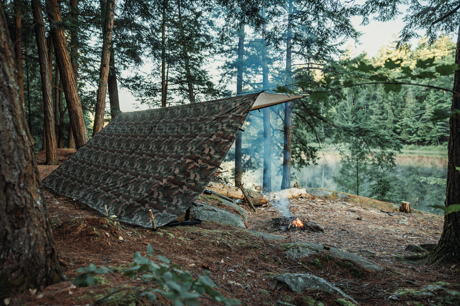 Defender heavy duty tarp pitched at camp